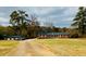 Ranch home on a large lot with a detached garage at 1824 Smith Store Rd, Covington, GA 30016