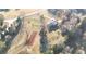 Aerial view of house and expansive lot with mature trees at 1824 Smith Store Rd, Covington, GA 30016