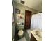 Bathroom with vintage wallpaper and a green toilet at 1824 Smith Store Rd, Covington, GA 30016