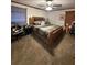 King-size bedroom with carpeted floor and ample light at 1824 Smith Store Rd, Covington, GA 30016