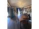 Dining room with wood table and chairs, hardwood floors at 1824 Smith Store Rd, Covington, GA 30016