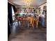 Dining room with wood table and chairs, hardwood floors at 1824 Smith Store Rd, Covington, GA 30016