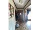 Bright entryway with wood flooring and coat rack at 1824 Smith Store Rd, Covington, GA 30016