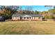 Ranch home with brick exterior and large yard at 1824 Smith Store Rd, Covington, GA 30016
