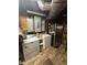 Laundry room with washer, dryer, and extra storage at 1824 Smith Store Rd, Covington, GA 30016