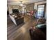 Spacious living room with stone fireplace and hardwood floors at 1824 Smith Store Rd, Covington, GA 30016