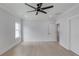Bright bedroom with hardwood floors and ceiling fan at 2626 Sardis Way, Buford, GA 30519