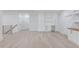 Spacious bonus room with hardwood floors and built-in cabinetry at 2626 Sardis Way, Buford, GA 30519