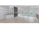 Bright bonus room with fireplace and built-in shelving at 2626 Sardis Way, Buford, GA 30519