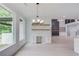 Elegant dining room features built-in shelving and hardwood floors at 2626 Sardis Way, Buford, GA 30519