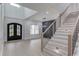 Elegant entryway with double doors and hardwood floors at 2626 Sardis Way, Buford, GA 30519