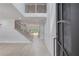 Bright and spacious entryway with hardwood floors, a staircase, and an open floor plan at 2626 Sardis Way, Buford, GA 30519