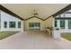 Covered patio with outdoor kitchen and access to backyard at 2626 Sardis Way, Buford, GA 30519