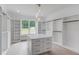 Spacious Primary closet with ample shelving and drawers at 2626 Sardis Way, Buford, GA 30519