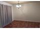 Dining room with tile flooring and a chandelier at 2705 Greystone Pl, Austell, GA 30106