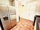 Kitchen boasts stainless steel appliances and ample cabinet space at 2705 Greystone Pl, Austell, GA 30106