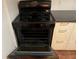 Black gas oven with the door open at 2705 Greystone Pl, Austell, GA 30106