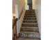 Carpeted stairway leading to the upper level at 2705 Greystone Pl, Austell, GA 30106