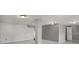 Large, open basement with white and gray walls, ready for customization at 370 Charlyne Way, Dacula, GA 30019