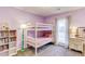 Purple bedroom with bunk beds and window at 370 Charlyne Way, Dacula, GA 30019