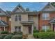 Brick townhouse exterior with landscaping and a welcoming entrance at 2031 Austin Park Cir, Decatur, GA 30032