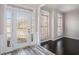 Bright entryway with hardwood floors, a glass door and access to other rooms at 2612 Grove Park Ln, Conyers, GA 30094