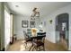 Dining room with glass table, black chairs, and window at 675 Station View Run, Lawrenceville, GA 30043