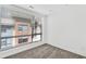 Bright bedroom with grey carpet and large windows at 966 Moda Dr, Atlanta, GA 30316