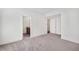 Spacious bedroom with grey carpet and en-suite bathroom at 966 Moda Dr, Atlanta, GA 30316