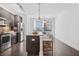 Modern kitchen with stainless steel appliances and island at 966 Moda Dr, Atlanta, GA 30316