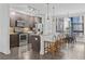 Modern kitchen with stainless steel appliances and breakfast bar at 966 Moda Dr, Atlanta, GA 30316