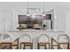 Modern kitchen with stainless steel appliances and island at 966 Moda Dr, Atlanta, GA 30316