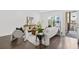 Open living space with hardwood floors and access to balcony at 966 Moda Dr, Atlanta, GA 30316