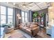 Spacious living room with hardwood floors and large windows at 32 Peachtree Nw St # 1106, Atlanta, GA 30303