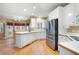 Kitchen featuring white cabinets, stainless steel appliances, and ample counter space at 514 Lovinggood Ct, Woodstock, GA 30189