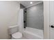 Updated bathroom with shower/tub combo and decorative tile at 175 Jayne Ellen Way, Alpharetta, GA 30009