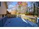 Back deck overlooks fenced backyard with mature trees at 175 Jayne Ellen Way, Alpharetta, GA 30009