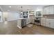 Open concept kitchen with island and stainless steel appliances at 175 Jayne Ellen Way, Alpharetta, GA 30009