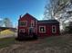 Back of house with deck and wooded area at 7472 Wood Ct, Lithonia, GA 30058