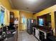 Kitchen with wood cabinets, yellow walls, and ample counter space at 7472 Wood Ct, Lithonia, GA 30058