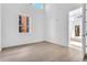 Spacious bedroom with large window and hardwood floors at 775 Juniper Ne St # 619, Atlanta, GA 30308
