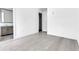 Bright bedroom with wood-look floors and an ensuite bathroom at 775 Juniper Ne St # 619, Atlanta, GA 30308