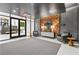 Elegant lobby with comfortable seating and a wood-paneled feature wall at 775 Juniper Ne St # 619, Atlanta, GA 30308