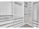 Spacious walk-in closet with ample shelving and drawers at 775 Juniper Ne St # 619, Atlanta, GA 30308