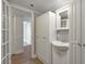 Bathroom with white vanity, ample storage, and tiled flooring at 6851 Roswell Rd # D14, Atlanta, GA 30328
