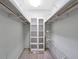 Walk-in closet with built-in shelving, ample hanging space, and wire racks at 6851 Roswell Rd # D14, Atlanta, GA 30328