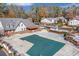 Community pool with cover, surrounded by trees and buildings at 6851 Roswell Rd # D14, Atlanta, GA 30328