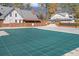 Covered community pool with brick clubhouse and landscaping at 6851 Roswell Rd # D14, Atlanta, GA 30328