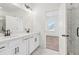 Modern bathroom with double vanity, marble flooring, and a separate shower at 1561 Layton Lane Nw Dr # 21, Atlanta, GA 30318