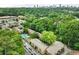 Aerial view of apartment complex with pool and lush green surroundings at 4266 Roswell Rd # Apt A 2, Atlanta, GA 30342